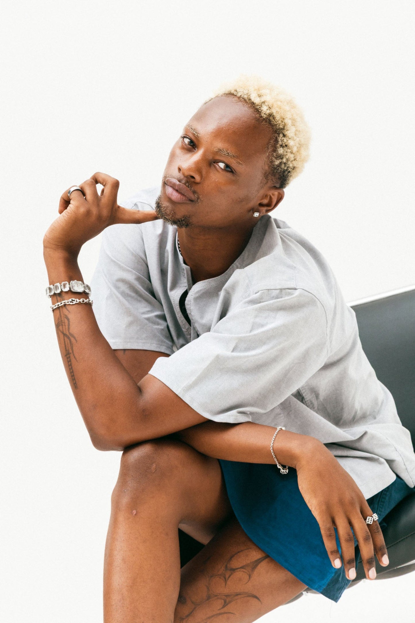 Person sitting on a chair with a neutral background wearing the ziyou blue lani set